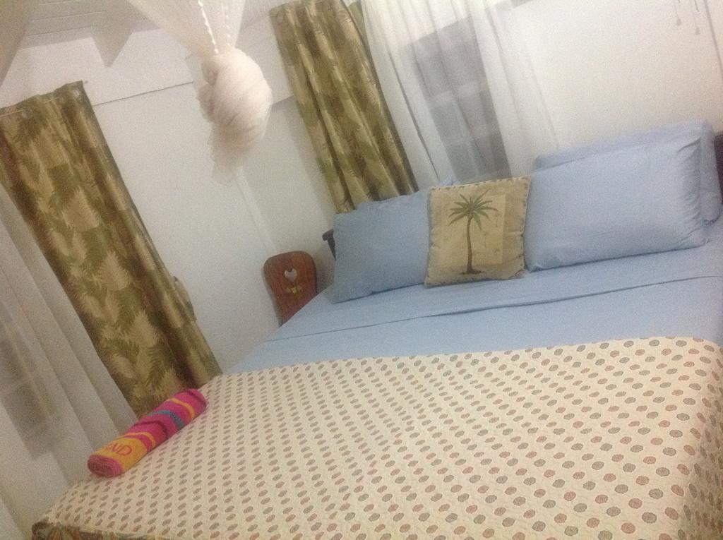 Rainbow Beach Apartments & Rooms Calibishie Rom bilde
